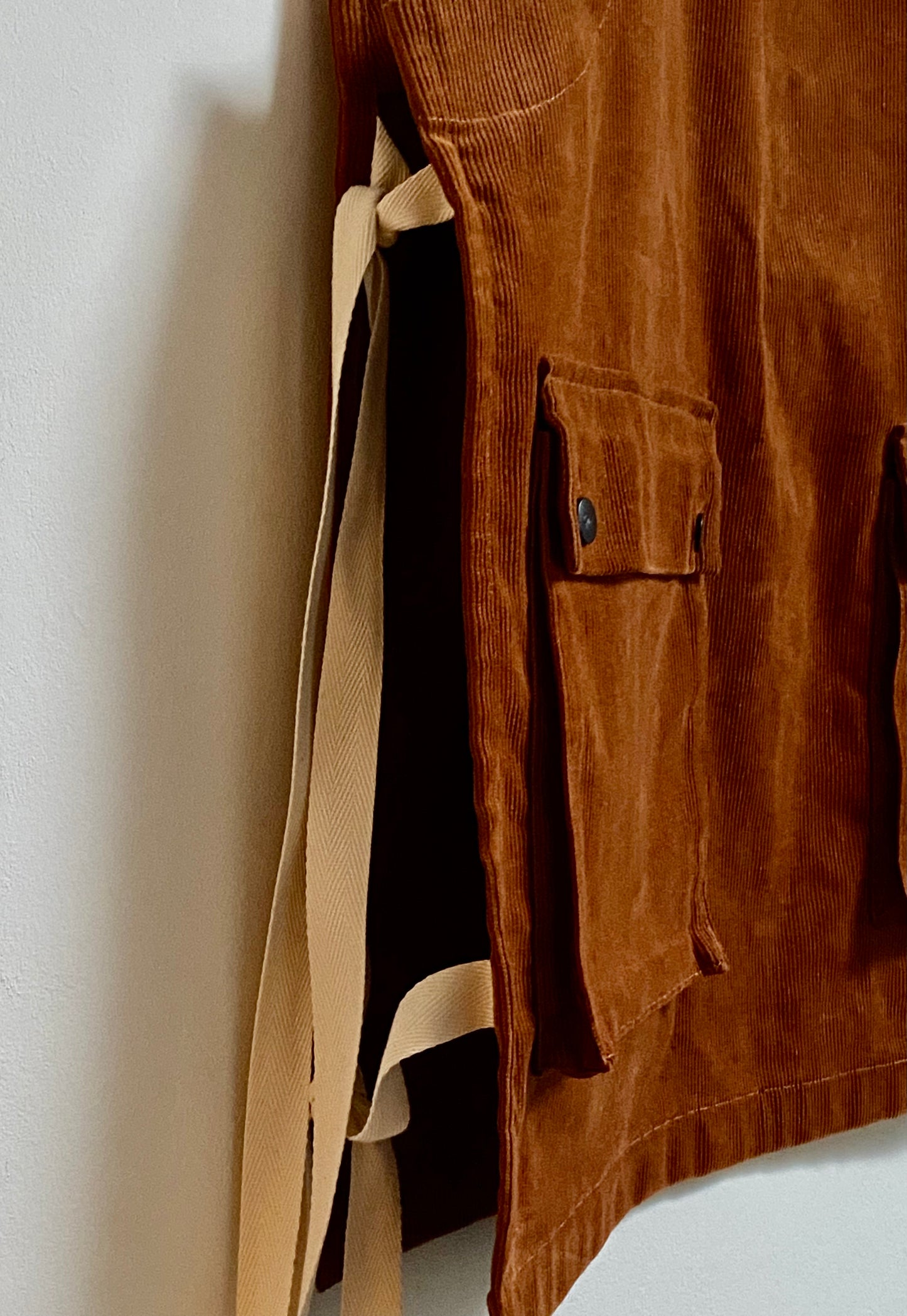 Murdoch popover vest cinnamon side view
